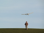 SX22353 Richard with plane taking off.jpg